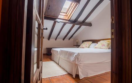 Casas de Aldea La Corrada de Torales II habitación