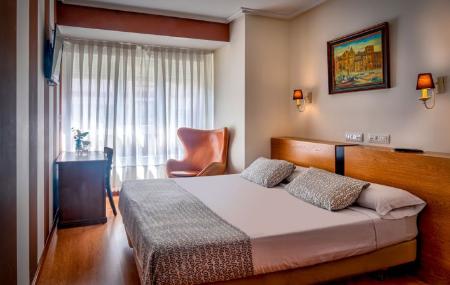 Costa Gijón habitación